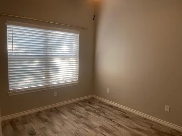 a view of empty room with a window