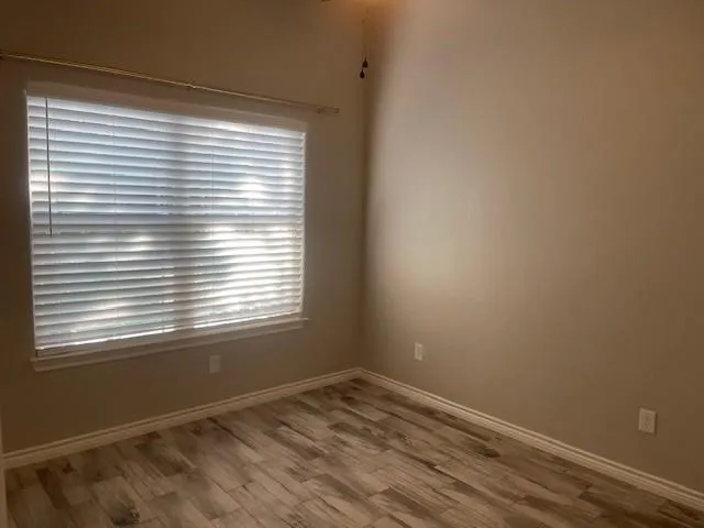 a view of empty room with a window