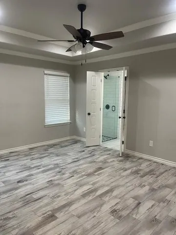 a view of an empty room and window