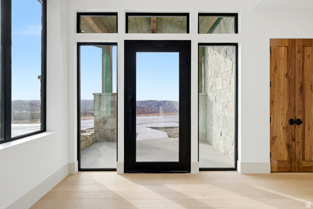 2155 East Wrangler Road Kamas, UT 84036 - Photo 13 of 62 Doorway to outside with wood finished floors and baseboards