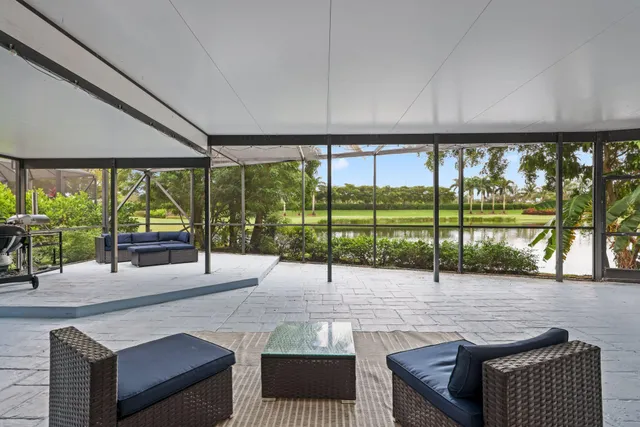 a view of a lake with houses in the back