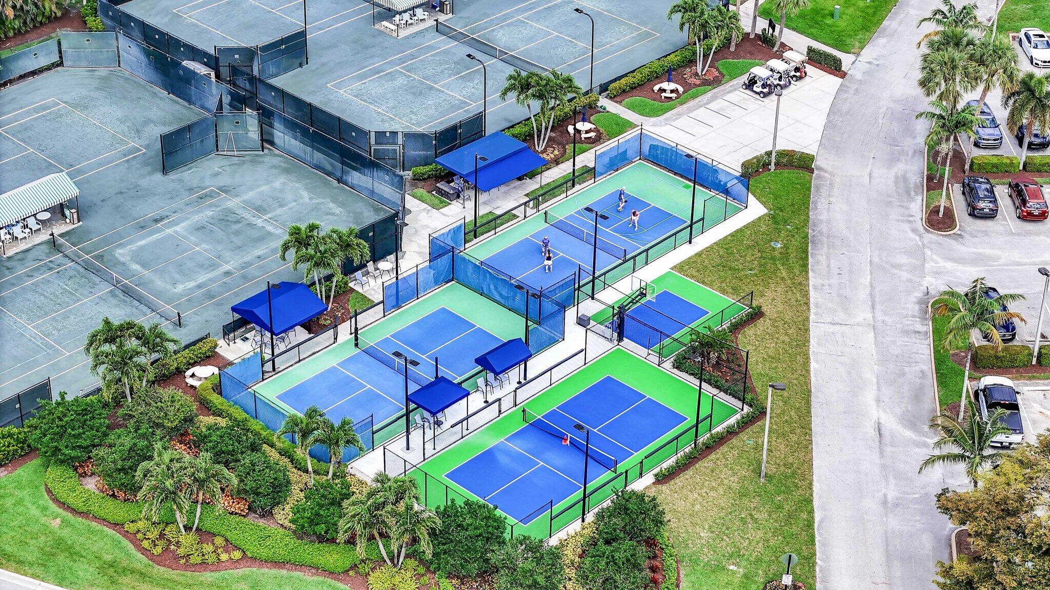 10106 Spyglass Way Boca Raton, FL 33498 - Photo 35 of 44 an aerial view of a yard tables and chairs