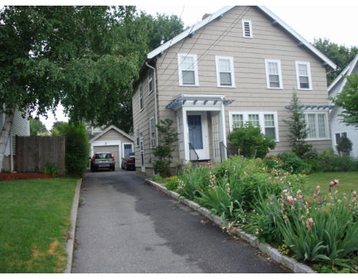81 Robbins Road Watertown, MA 02472 - Photo 1 of 11 a view of a house with a yard and tree s