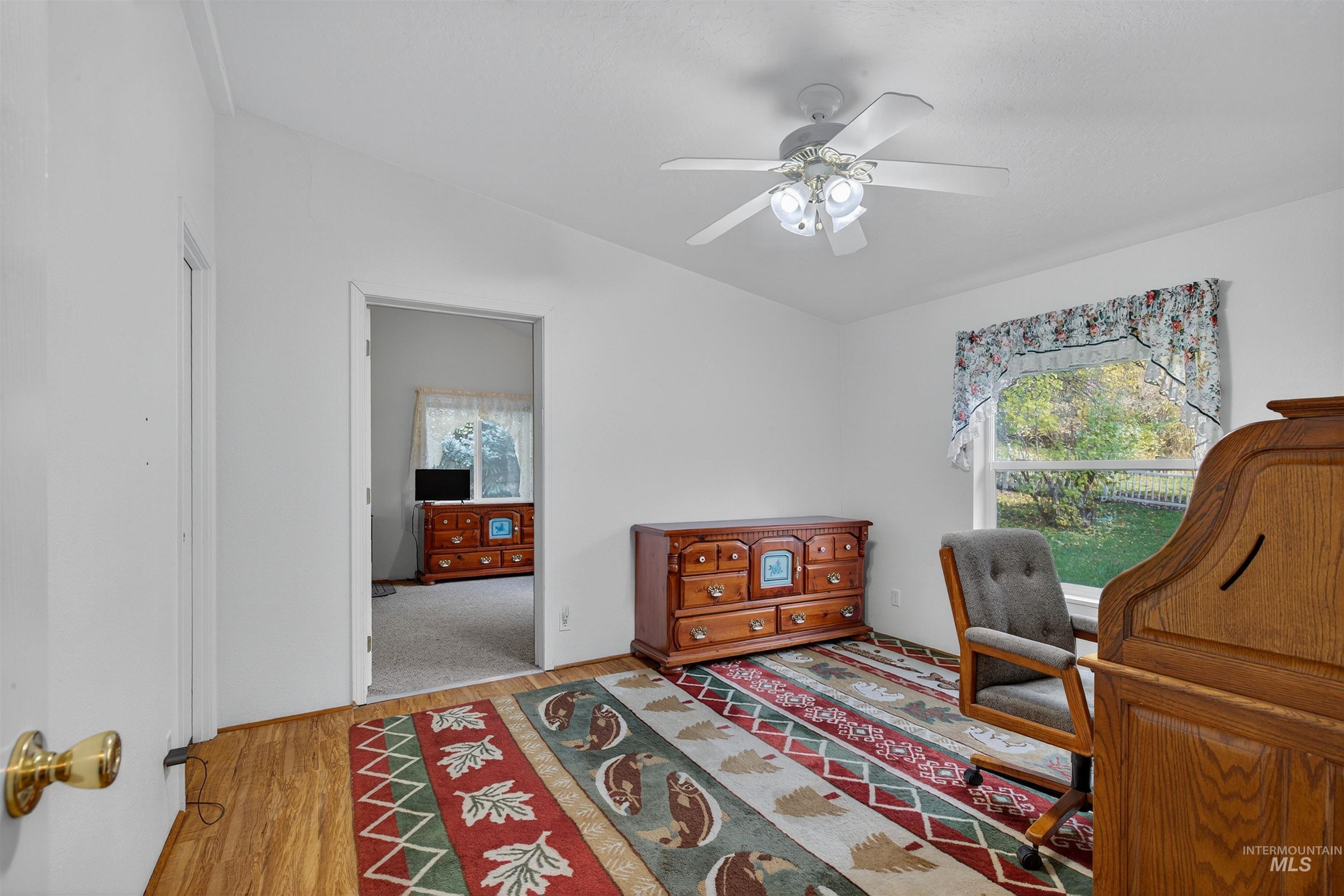 4151 Highway 13 Stites, ID 83552 - Photo 20 of 50 Office space featuring light wood finished floors, healthy amount of natural light, and a ceiling fan