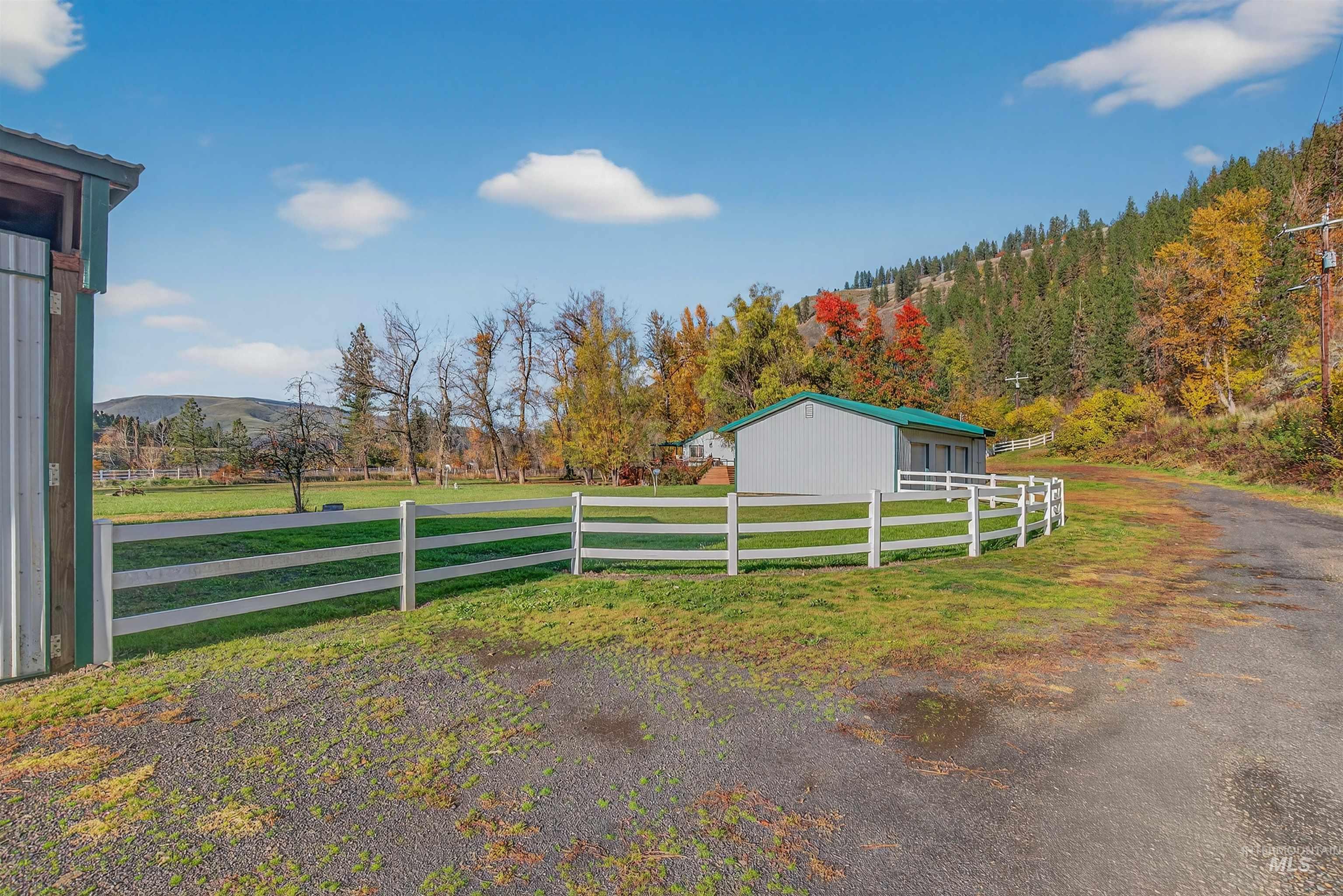 4151 Highway 13 Stites, ID 83552 - Photo 45 of 50 View of yard with an outbuilding, a mountain view, and a rural view