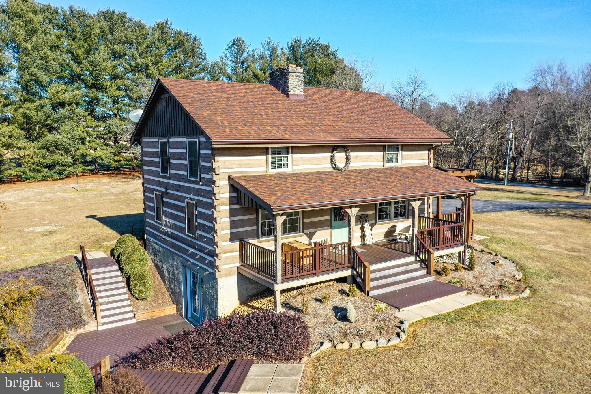 39424 Rodeffer Road Lovettsville, VA 20180 - Photo 3 of 94 Lower level deck/patio and planting beds