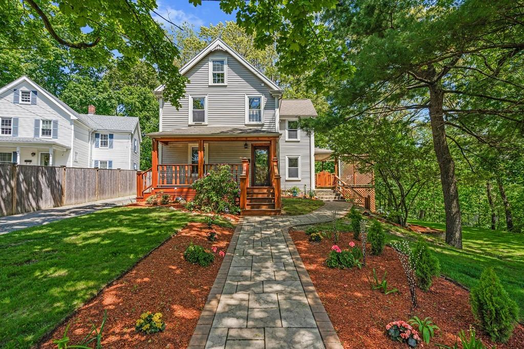 46 River Ridge Wellesley, MA 02481 - Photo 1 of 27 a front view of a house with a yard