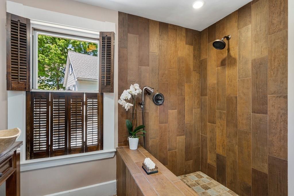 46 River Ridge Wellesley, MA 02481 - Photo 17 of 27 a bathroom with a shower and a sink