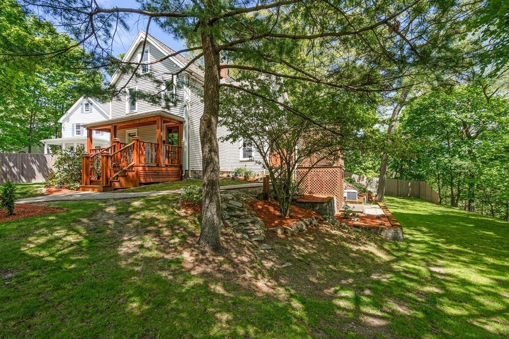 46 River Ridge Wellesley, MA 02481 - Photo 21 of 27 a front view of a house with garden