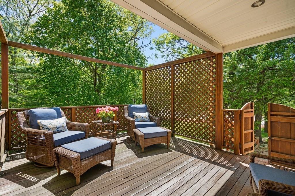 46 River Ridge Wellesley, MA 02481 - Photo 23 of 27 a view of a wooden deck with furniture