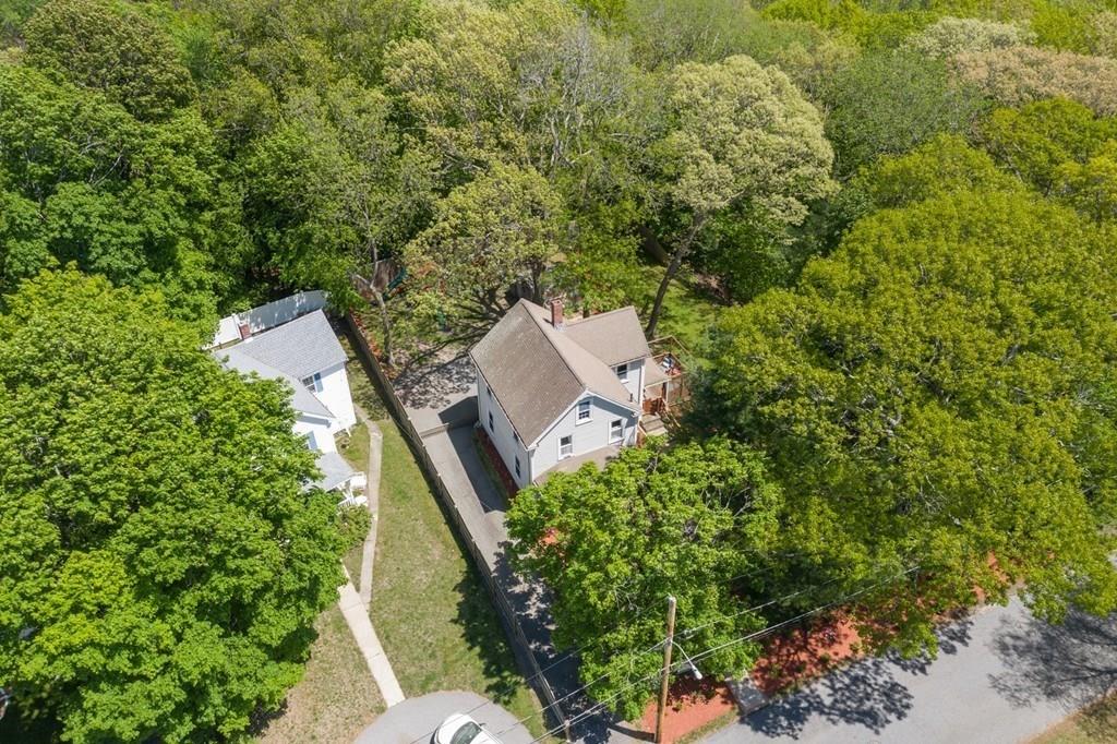 46 River Ridge Wellesley, MA 02481 - Photo 27 of 27 an aerial view of a house with a yard and trees all around