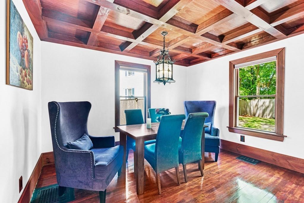 46 River Ridge Wellesley, MA 02481 - Photo 7 of 27 a view of a dining room with furniture a chandelier and wooden floor