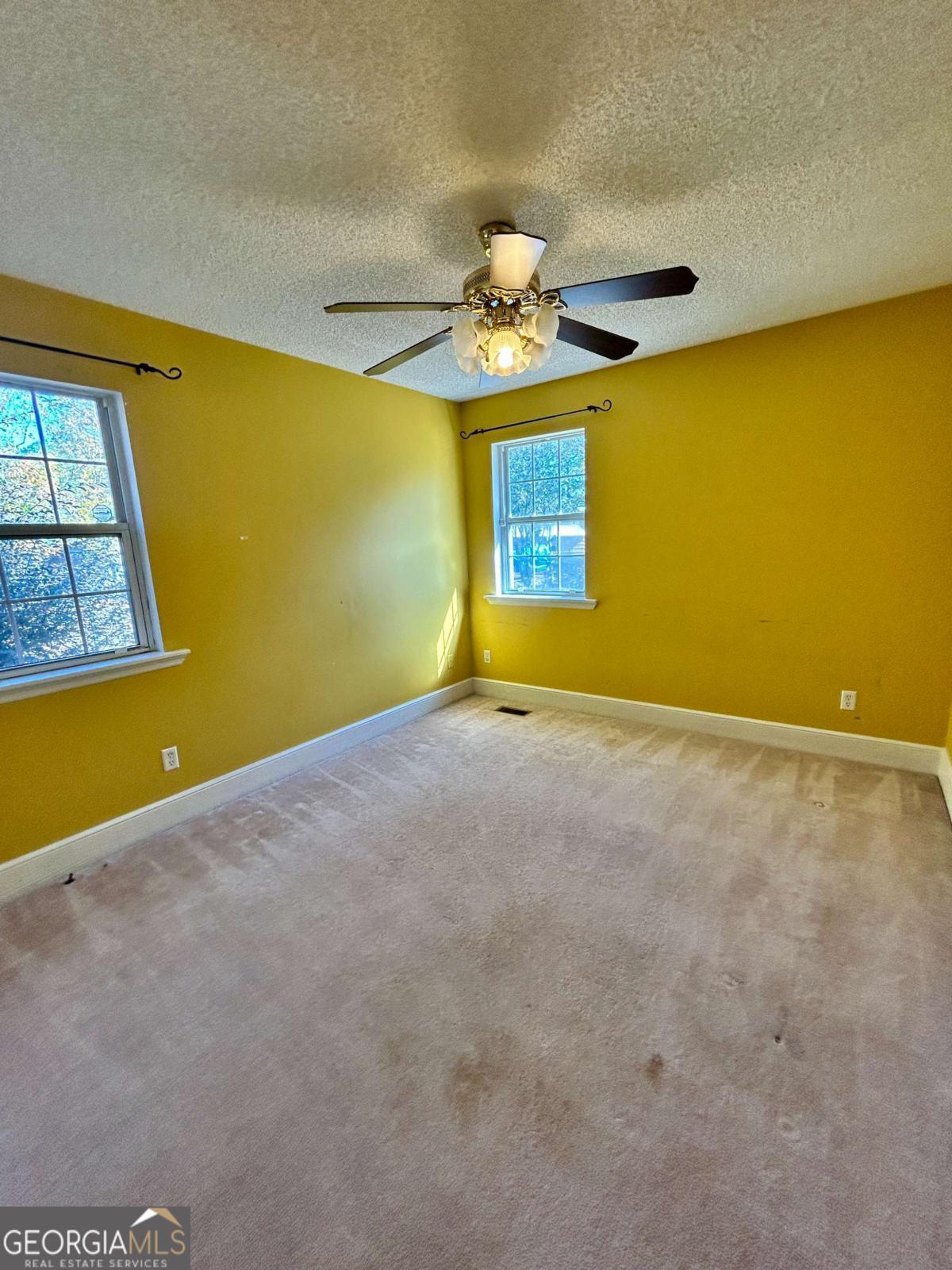 39 Paradise Lake Road Tifton, GA 31794 - Photo 18 of 23 a view of an empty room with a window
