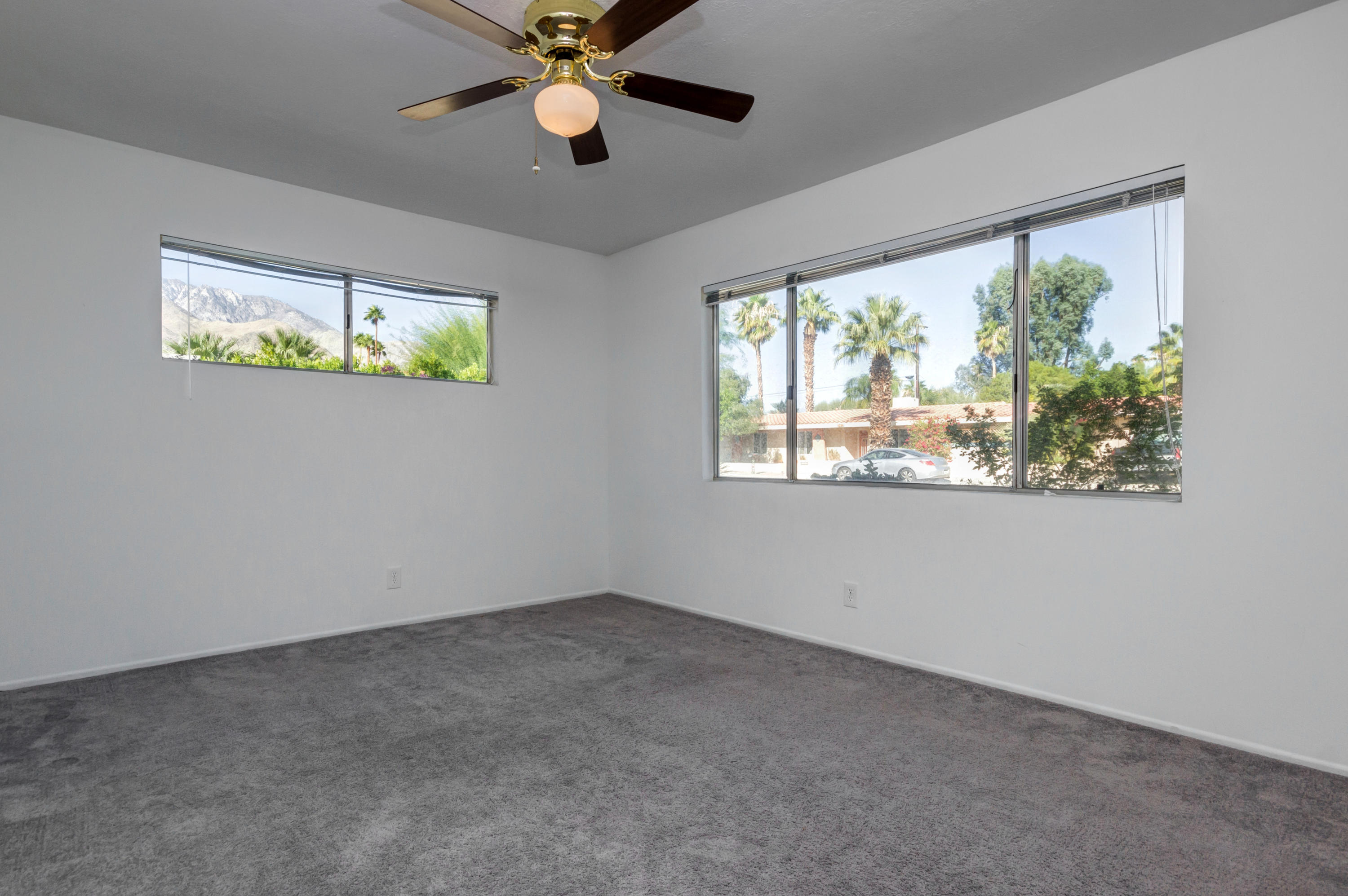 1253 Linda Vista Road Palm Springs, CA 92262 - Photo 16 of 29 a view of an empty room with a window
