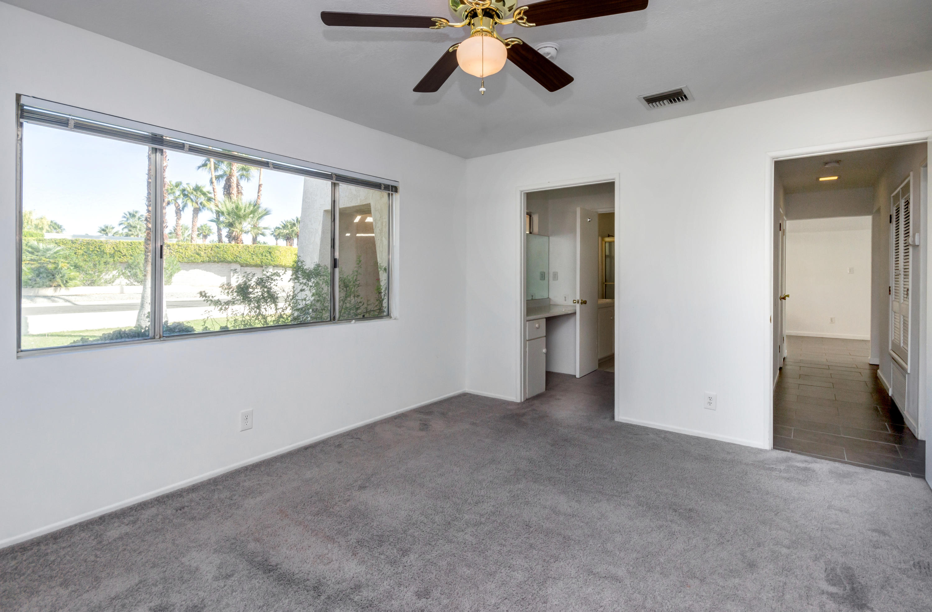 1253 Linda Vista Road Palm Springs, CA 92262 - Photo 17 of 29 a view of an empty room with a window