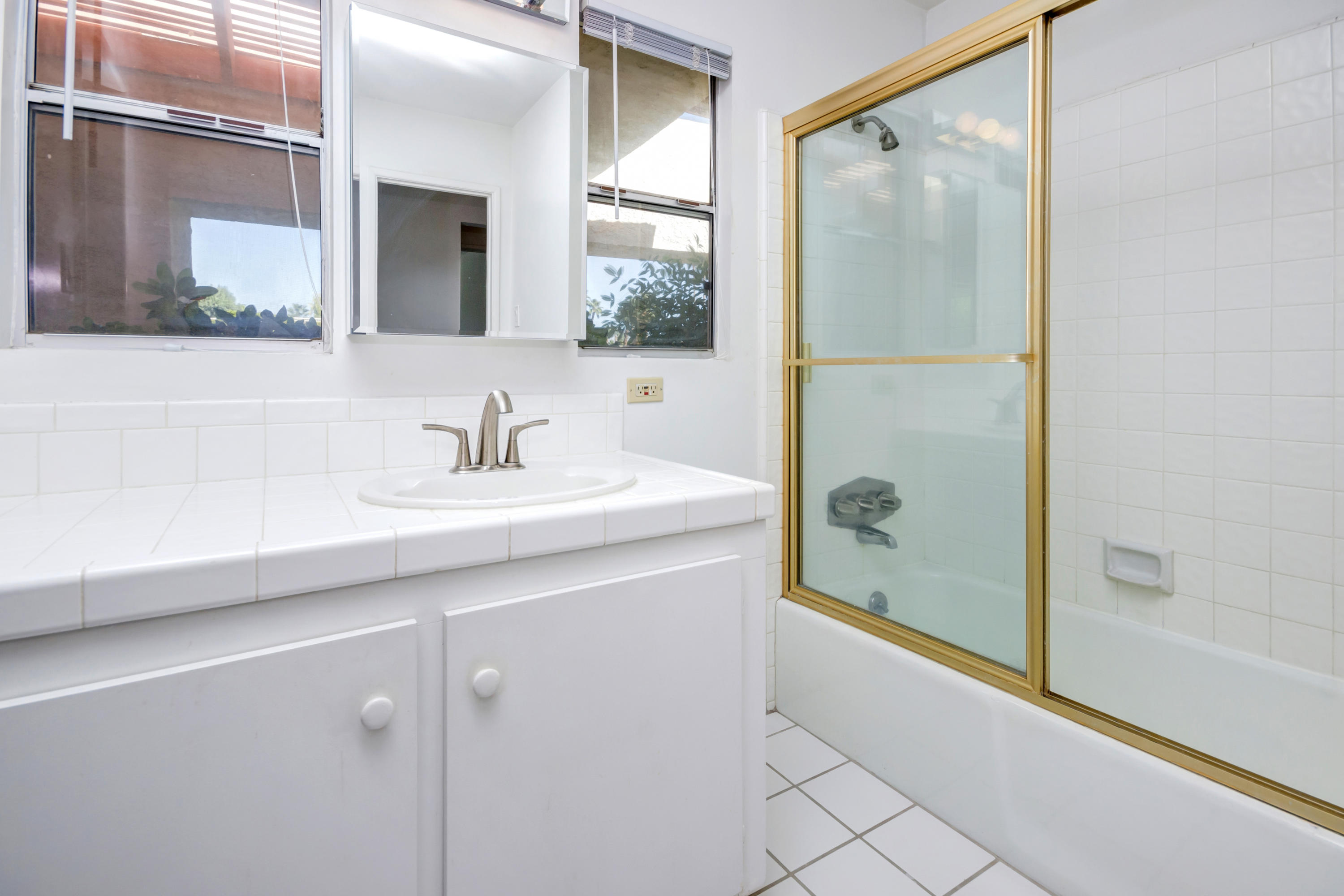 1253 Linda Vista Road Palm Springs, CA 92262 - Photo 18 of 29 a bathroom with a sink and a mirror