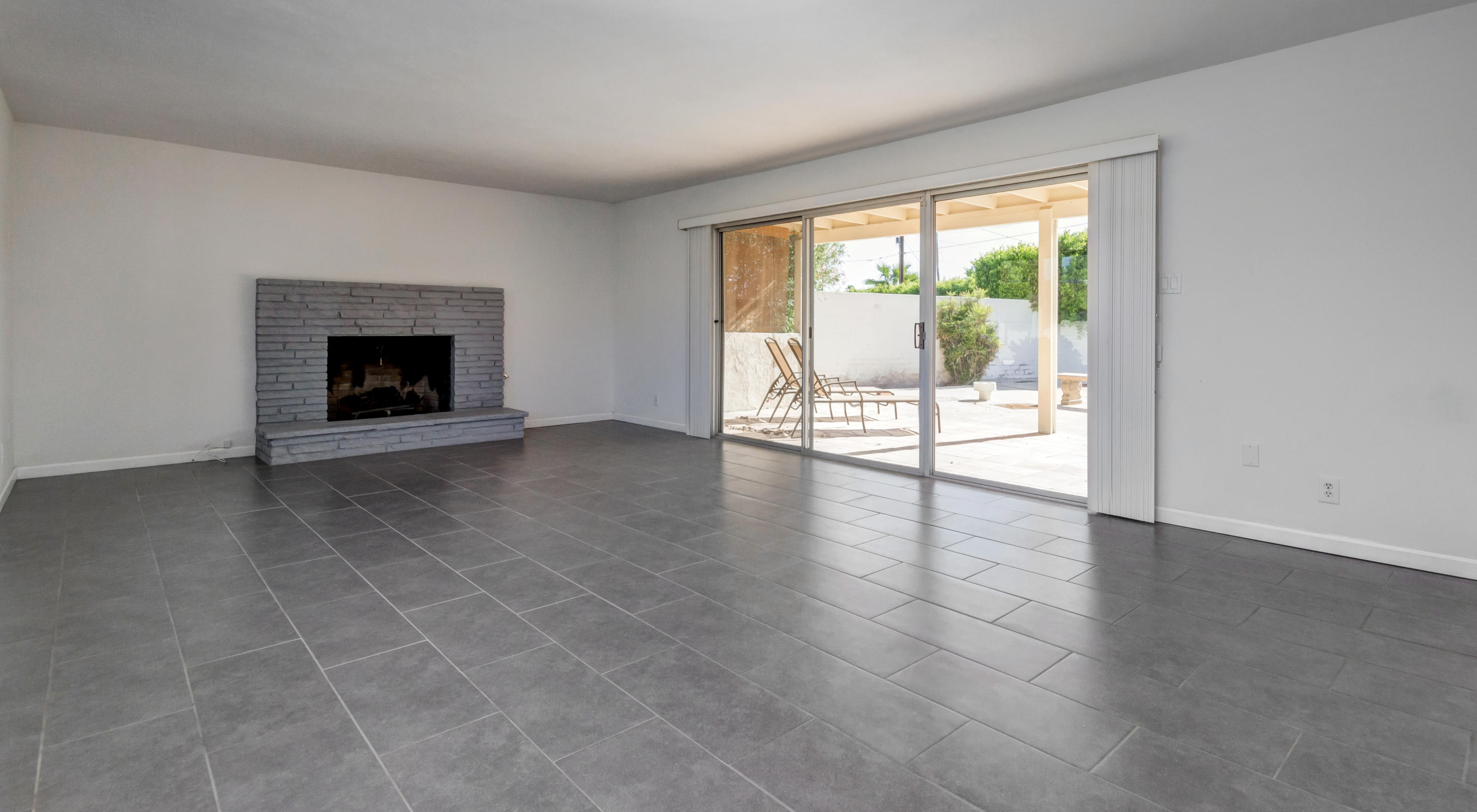 1253 Linda Vista Road Palm Springs, CA 92262 - Photo 8 of 29 an empty room with floor to ceiling window and an empty room