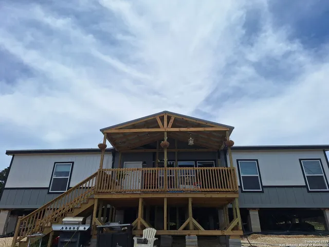 a front view of a house with parking space