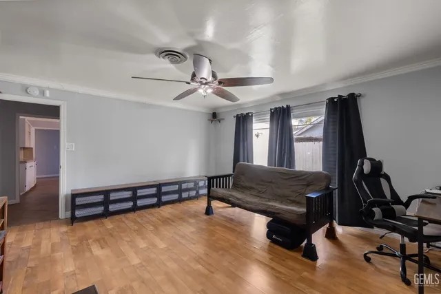 a view of an empty room with windows