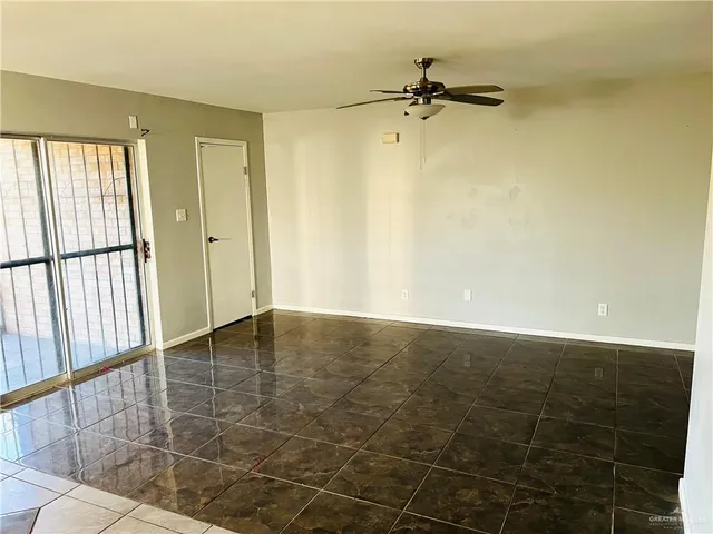 a view of a room with a staircase