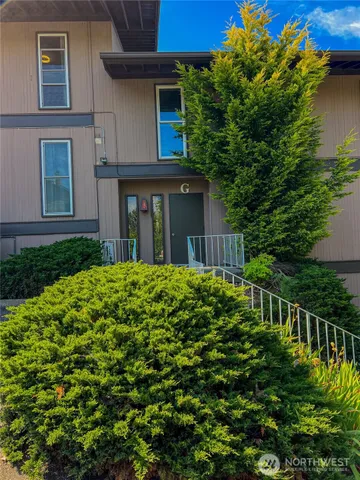 a view of a house with a garden