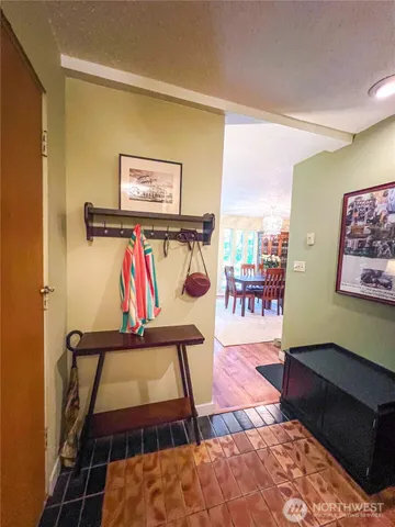 a bedroom with a bed and a table in it