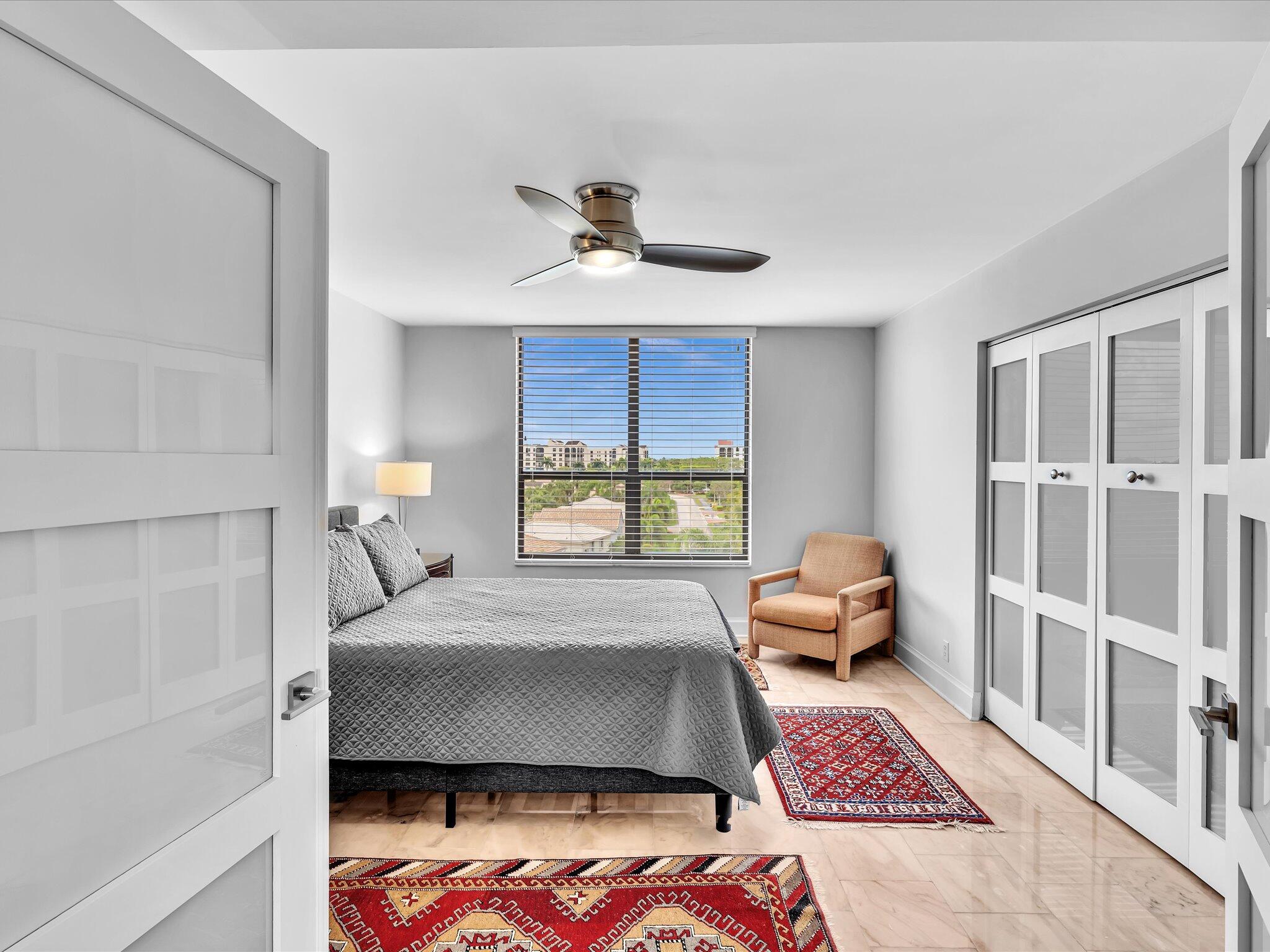 7201 Promenade Drive, Unit 602 Boca Raton, FL 33433 - Photo 13 of 77 a bedroom with a bed furniture and a window