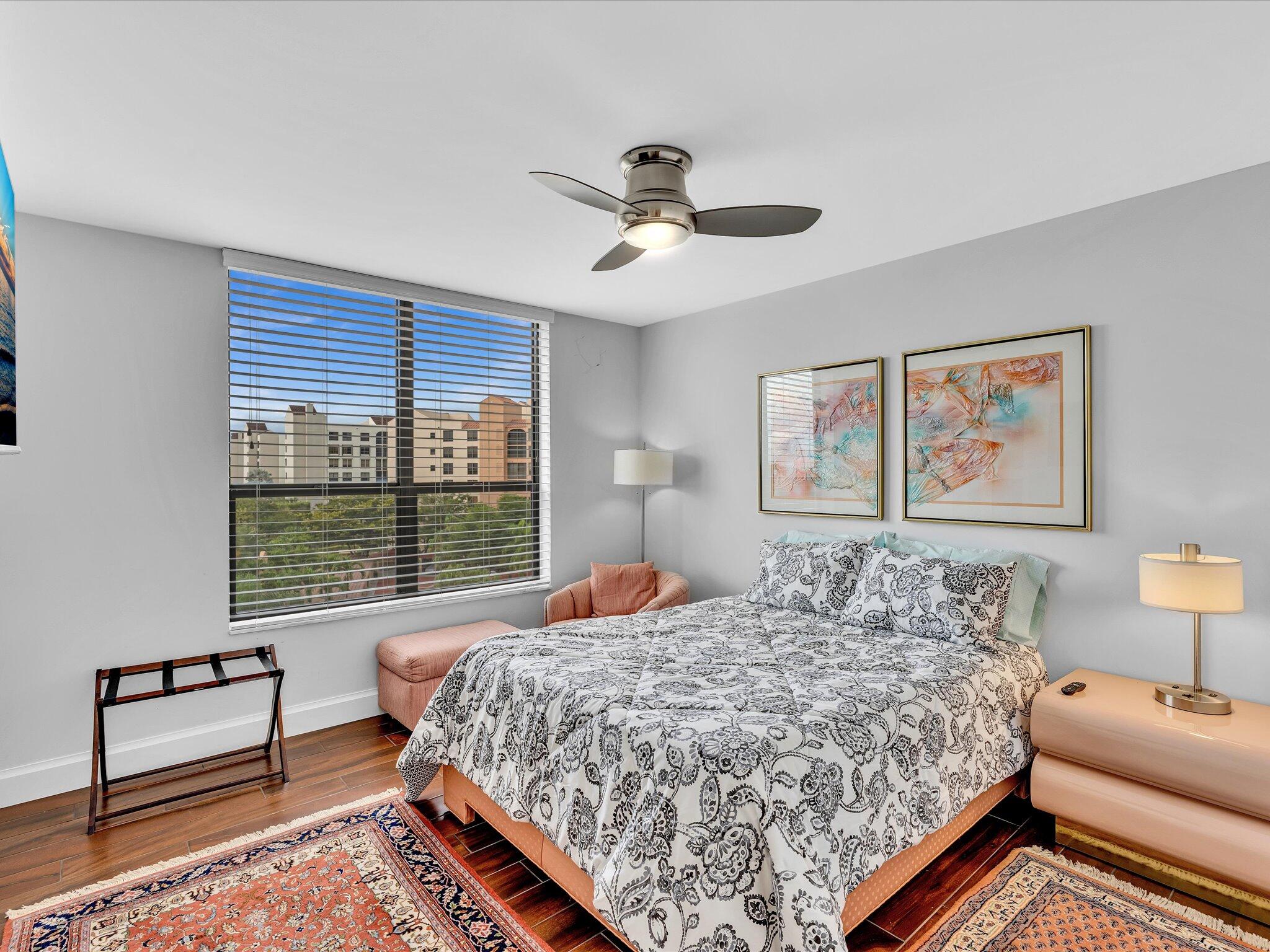 7201 Promenade Drive, Unit 602 Boca Raton, FL 33433 - Photo 14 of 77 a bedroom with a bed and a window