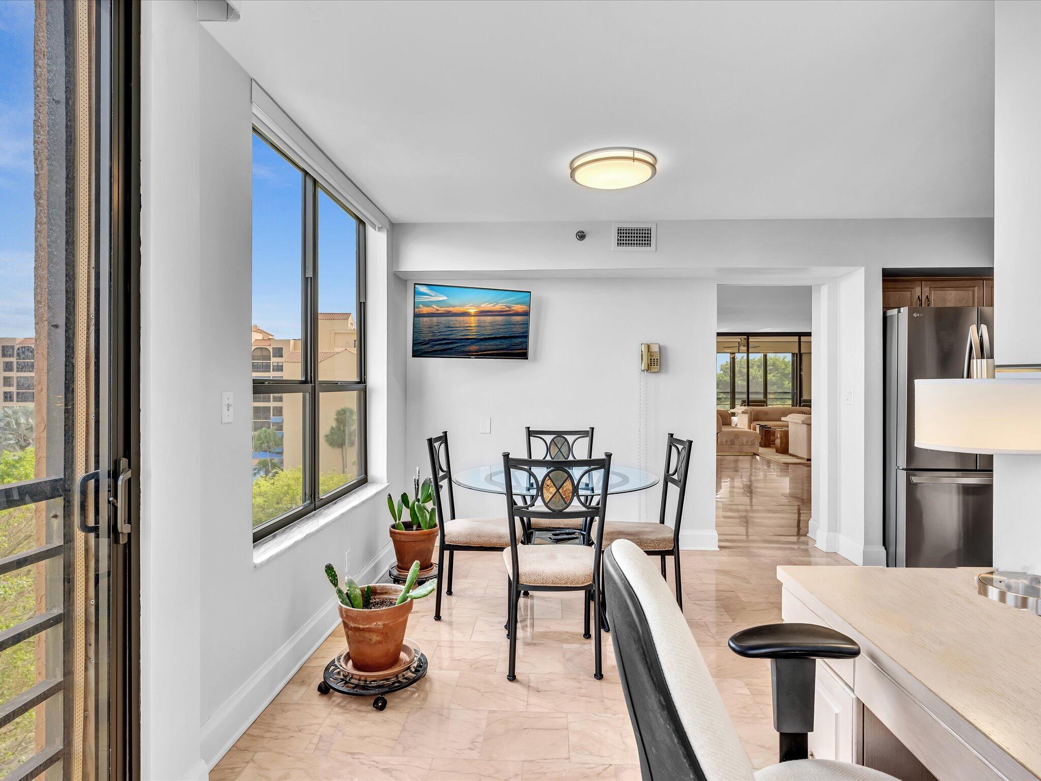 7201 Promenade Drive, Unit 602 Boca Raton, FL 33433 - Photo 37 of 77 a view of a livingroom with furniture and window