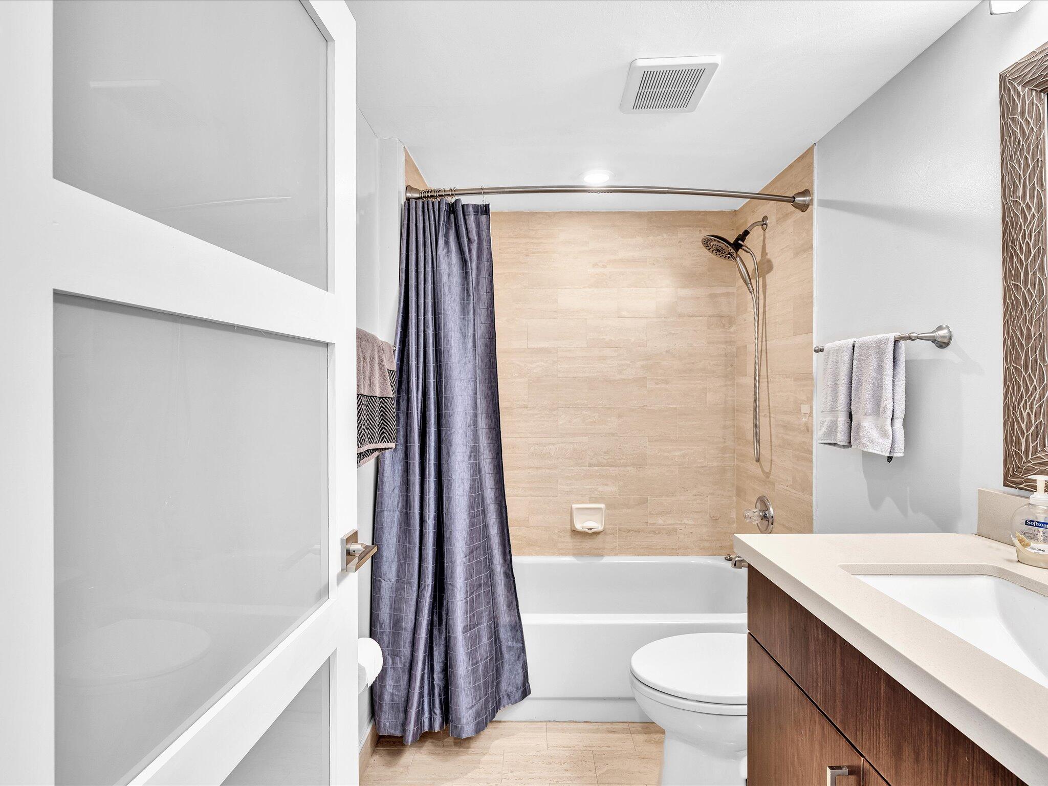 7201 Promenade Drive, Unit 602 Boca Raton, FL 33433 - Photo 57 of 77 a bathroom with a sink a toilet and a bathtub