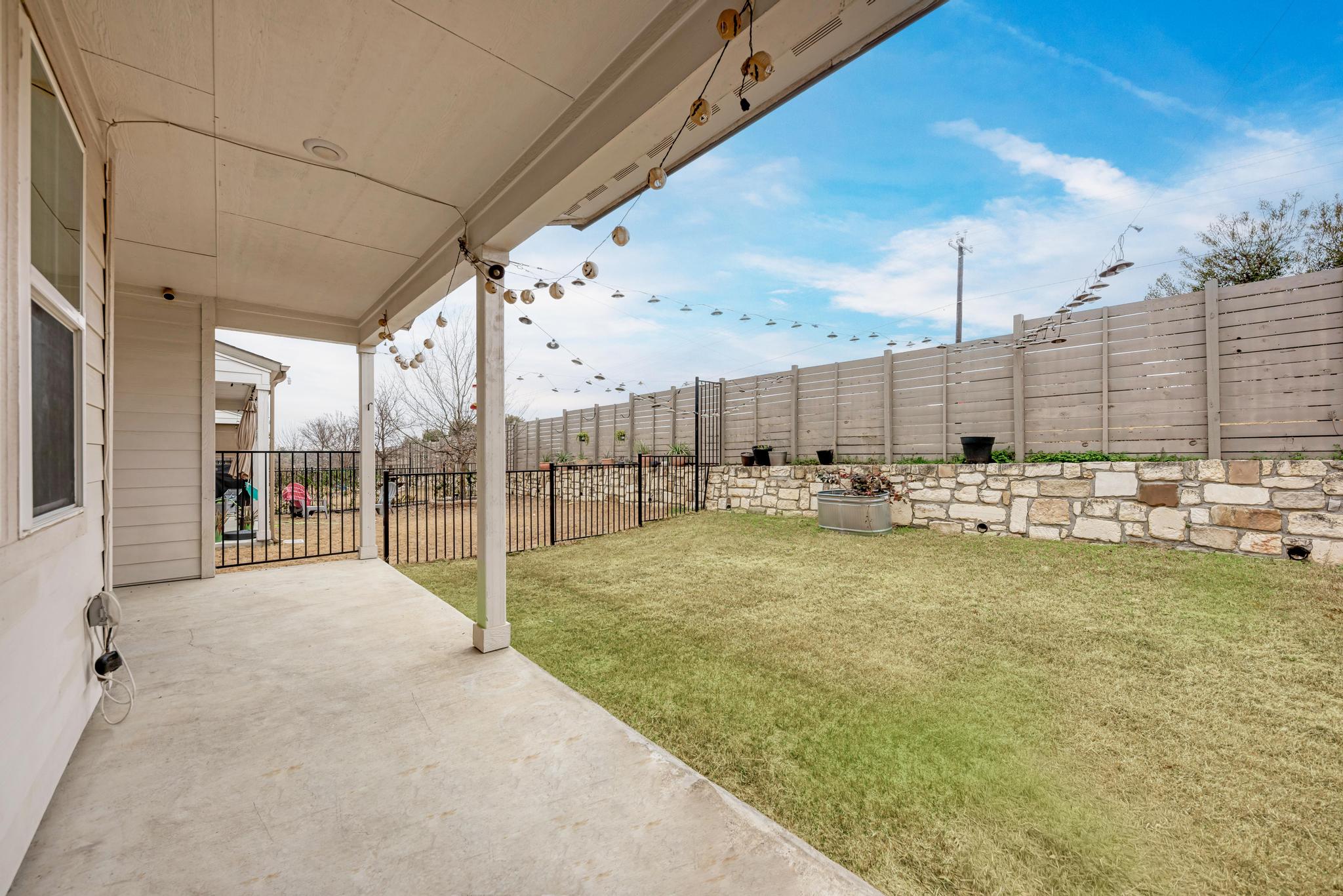 7319 Travertine Spring Drive, Unit 115 Austin, TX 78744 - Photo 34 of 37 a view of a swimming pool