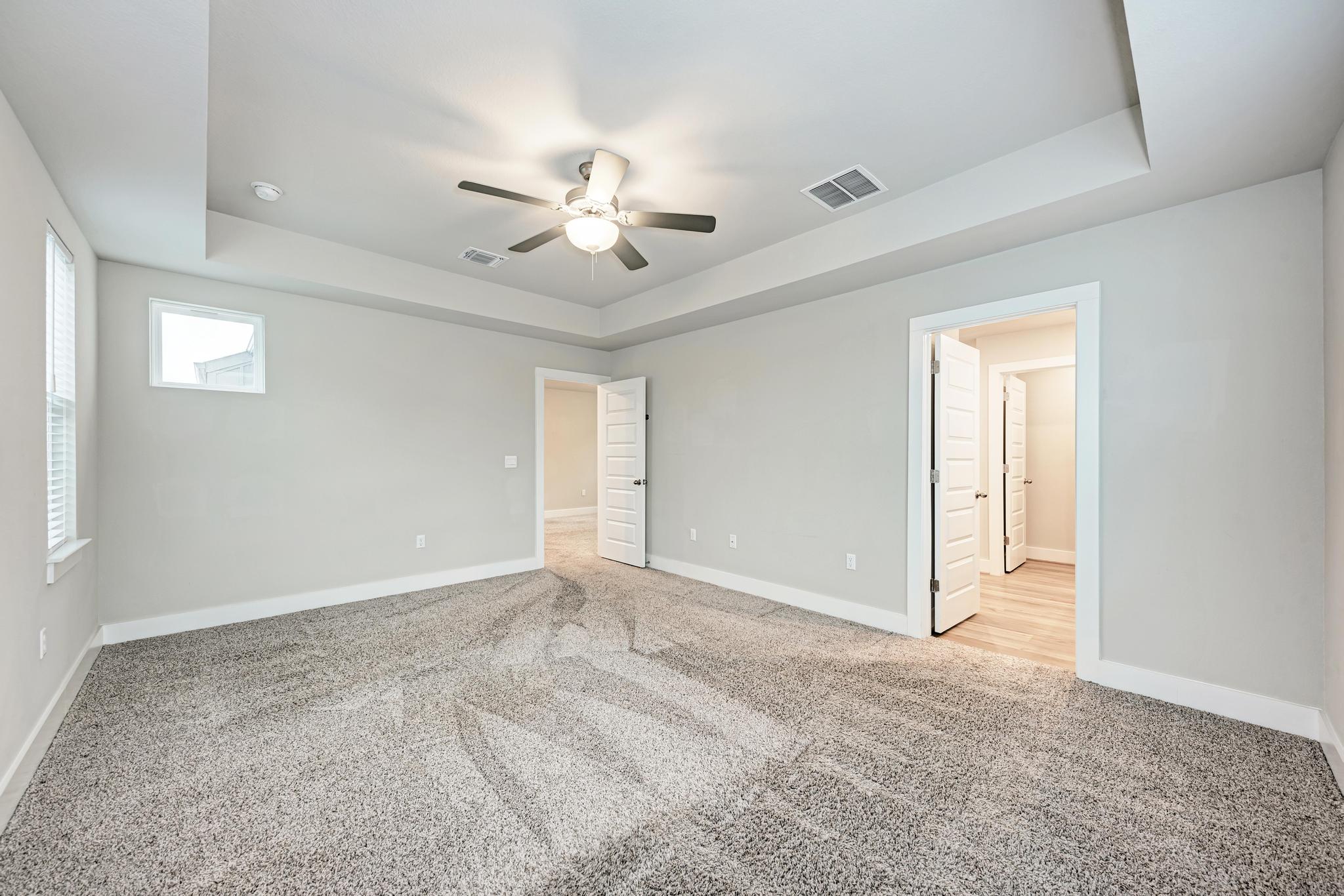 7319 Travertine Spring Drive, Unit 115 Austin, TX 78744 - Photo 4 of 37 a view of an empty room with a window