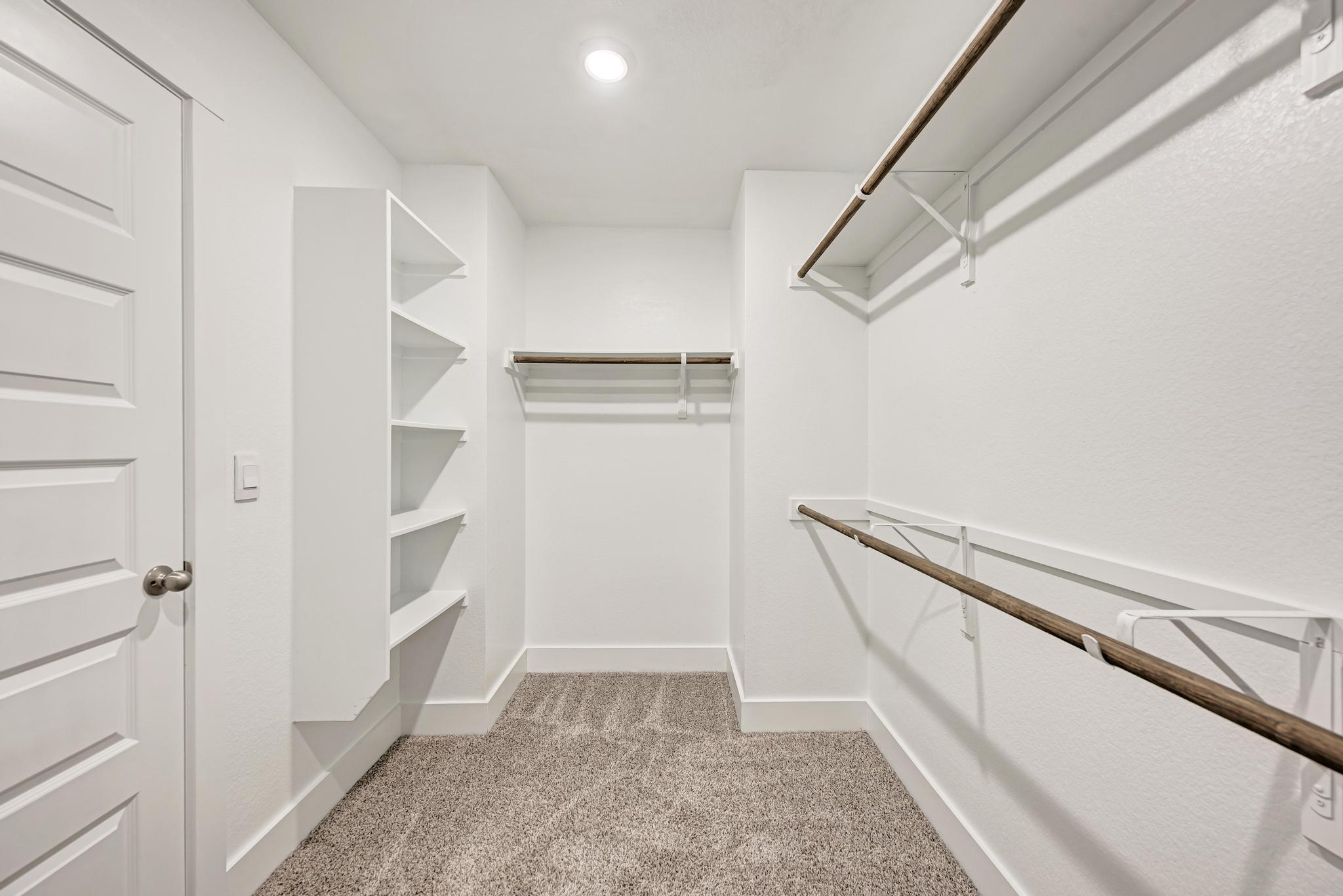 7319 Travertine Spring Drive, Unit 115 Austin, TX 78744 - Photo 6 of 37 a view of walk in closet