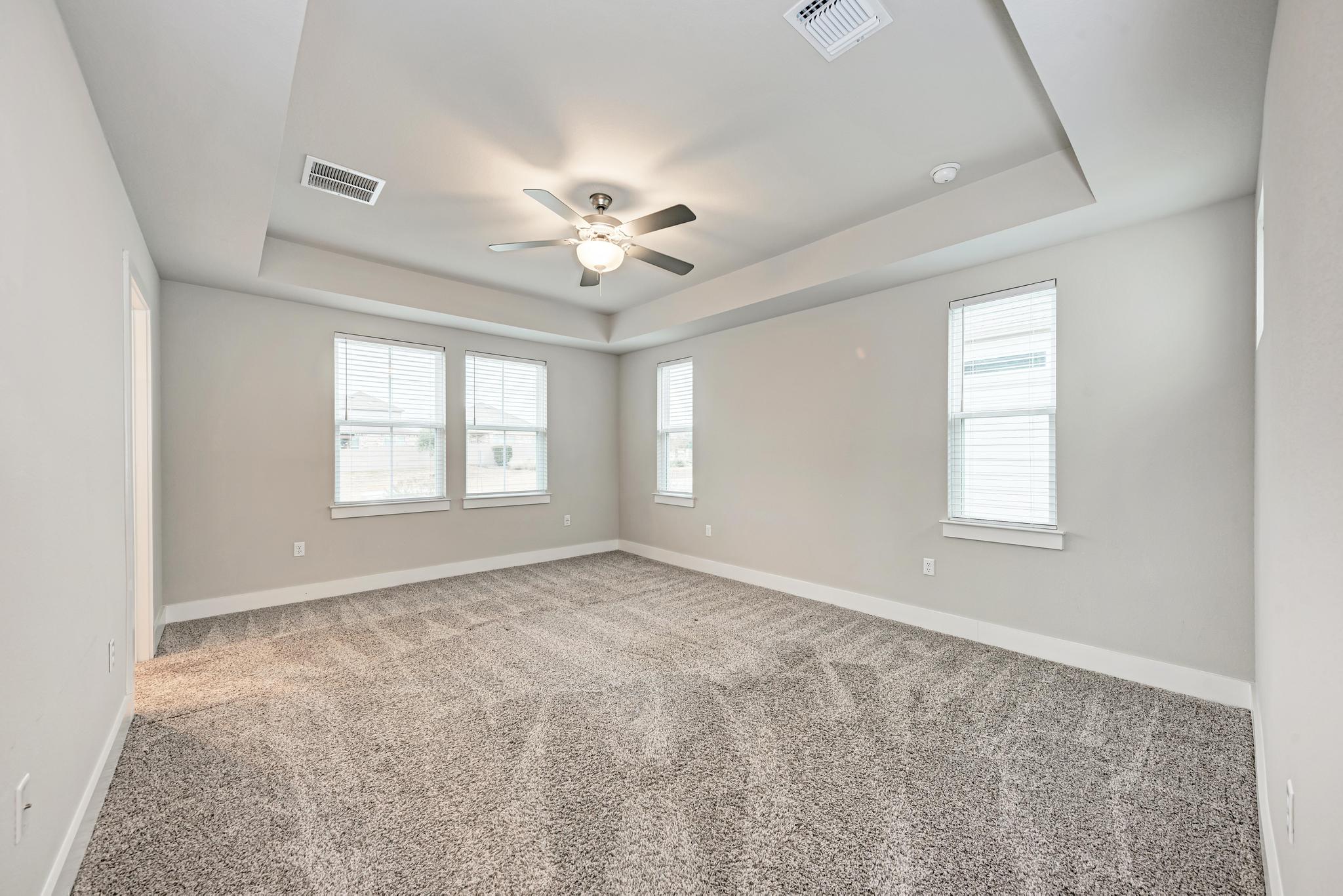 7319 Travertine Spring Drive, Unit 115 Austin, TX 78744 - Photo 7 of 37 a view of an empty room with a window