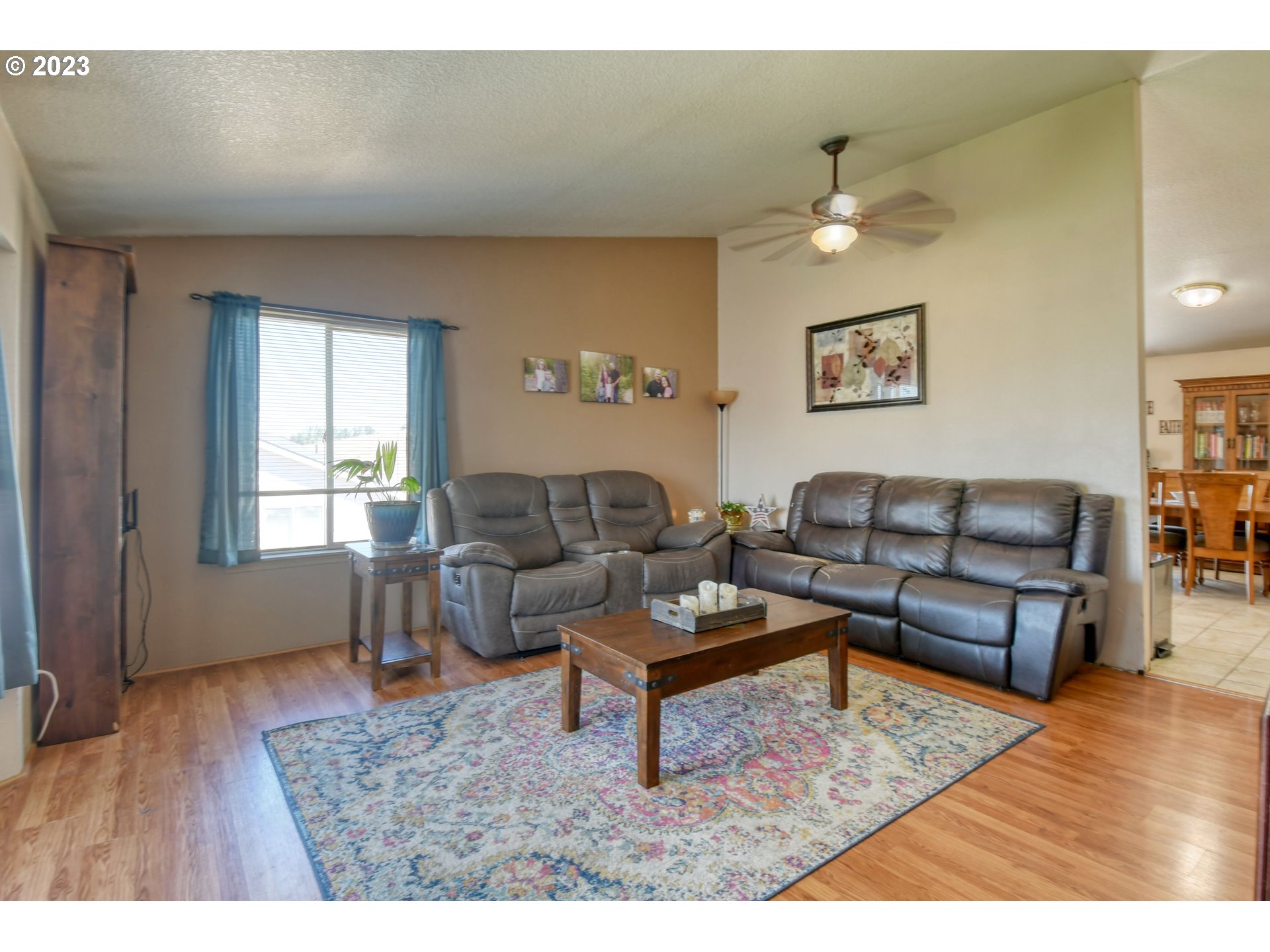 1306 Southwest 11th Court Pendleton, OR 97801 - Photo 6 of 27 a living room with furniture and a wooden floor