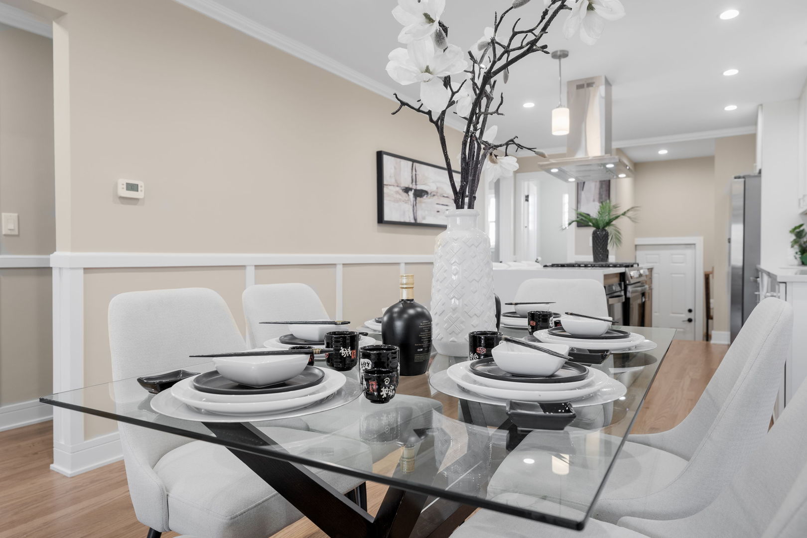 8549 South Indiana Avenue Chicago, IL 60619 - Photo 7 of 28 a kitchen with a table and chairs