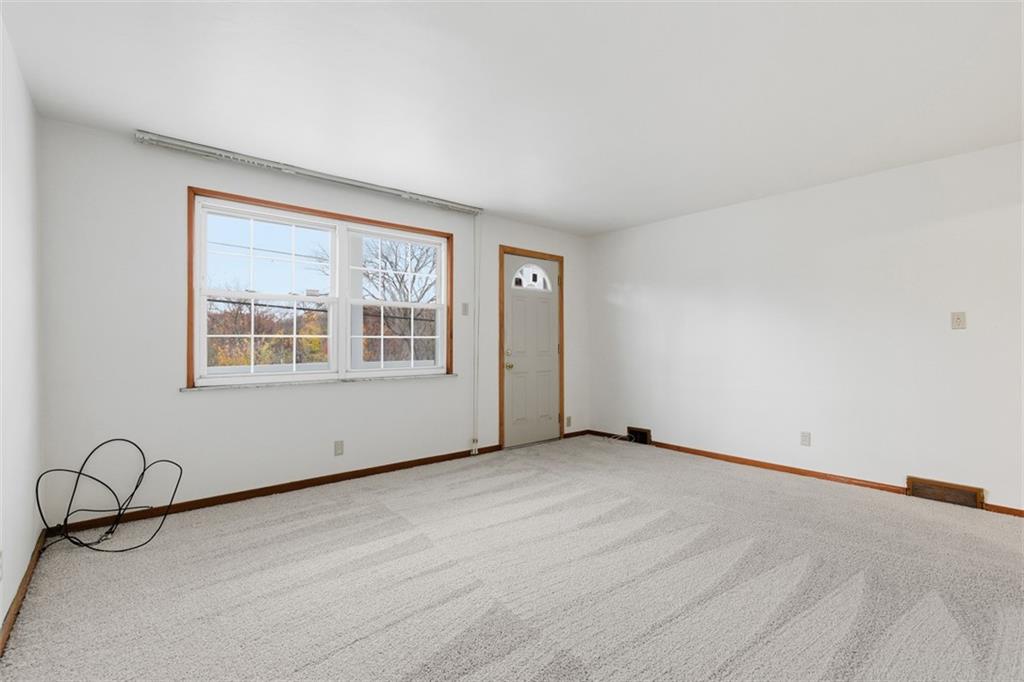 528 9th Street Pitcairn, PA 15140 - Photo 16 of 38 a view of an empty room with a window