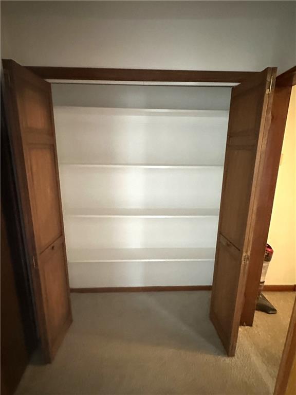 528 9th Street Pitcairn, PA 15140 - Photo 22 of 38 a view of walk in closet with empty racks