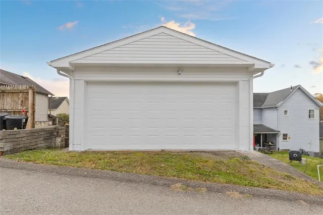 a view of a house with a garage