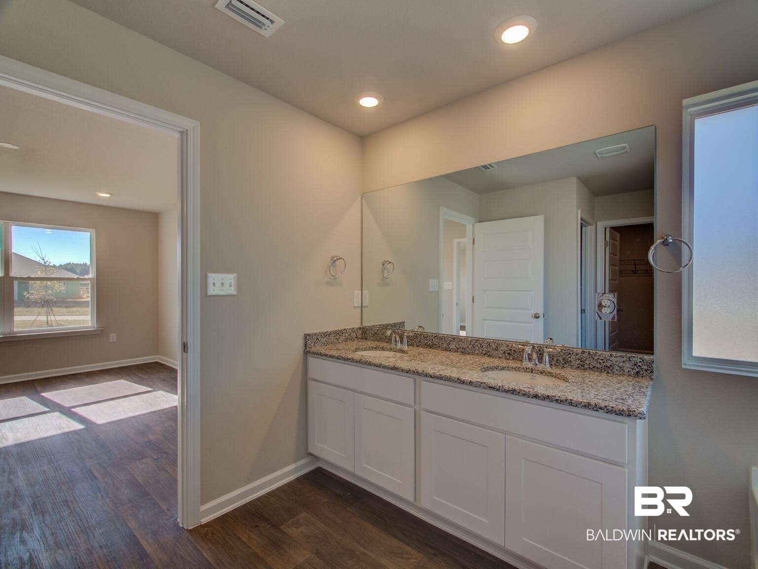 23953 Citation Loop Daphne, AL 36526 - Photo 20 of 49 Bathroom with dark wood-style floors, double vanity, and recessed lighting