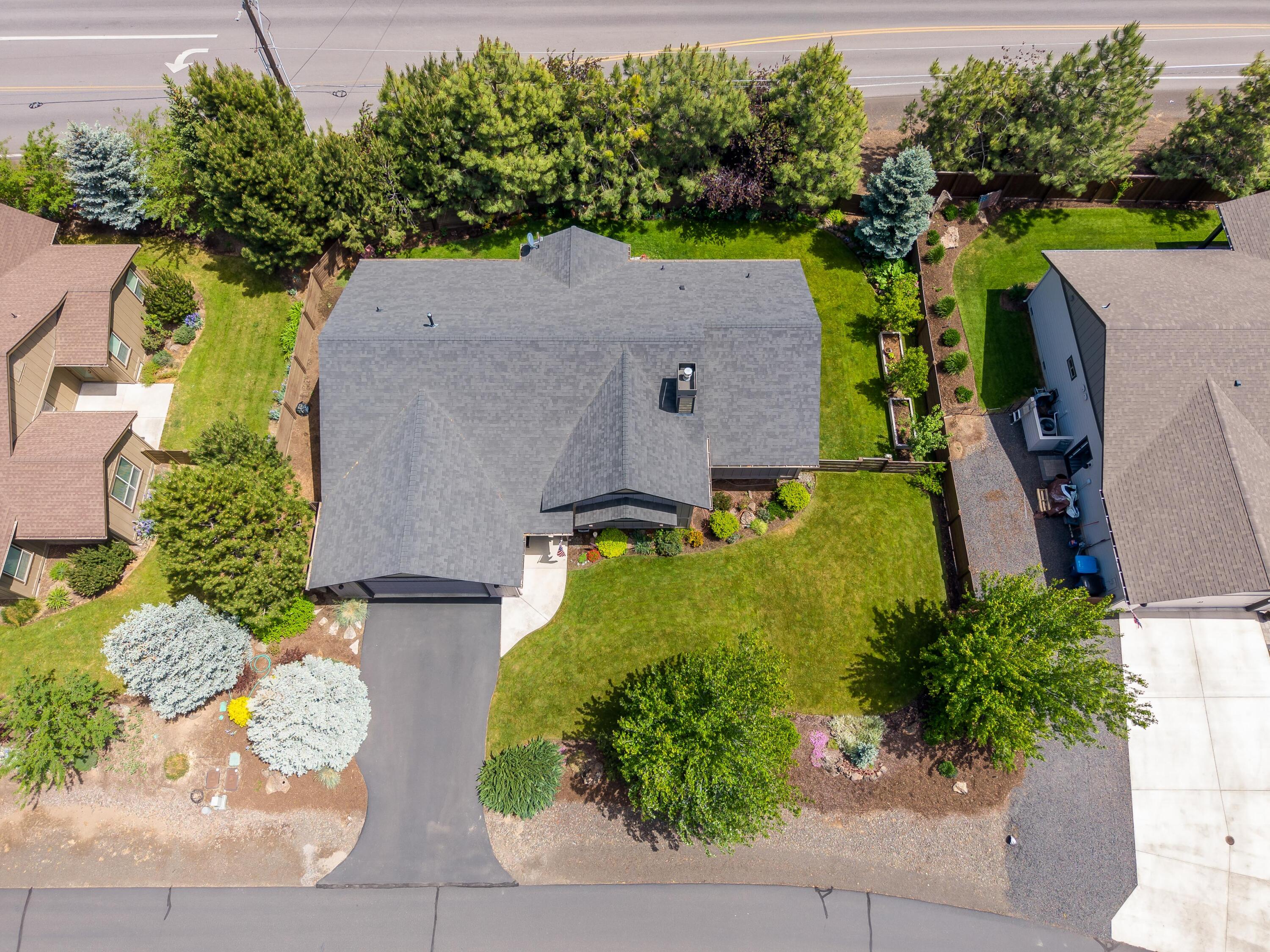 210 Northwest Saddle Ridge Loop Prineville, OR 97754 - Photo 37 of 38 an aerial view of a house with a garden