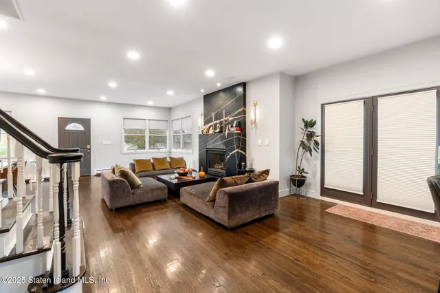 a kitchen with stainless steel appliances granite countertop a stove and cabinets