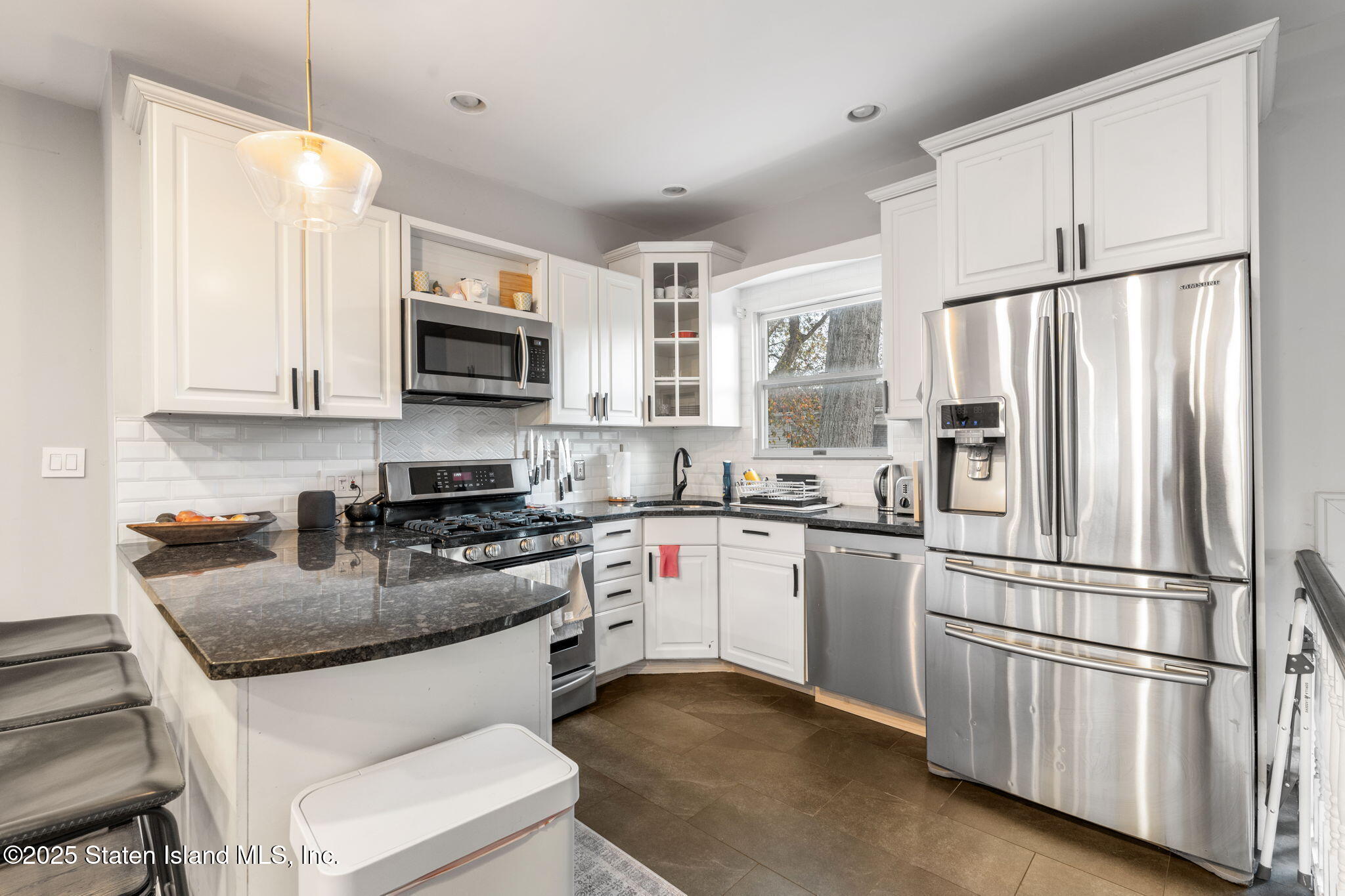6 Mosely Avenue Staten Island, NY 10312 - Photo 18 of 55 a kitchen with stainless steel appliances granite countertop a refrigerator stove microwave and sink