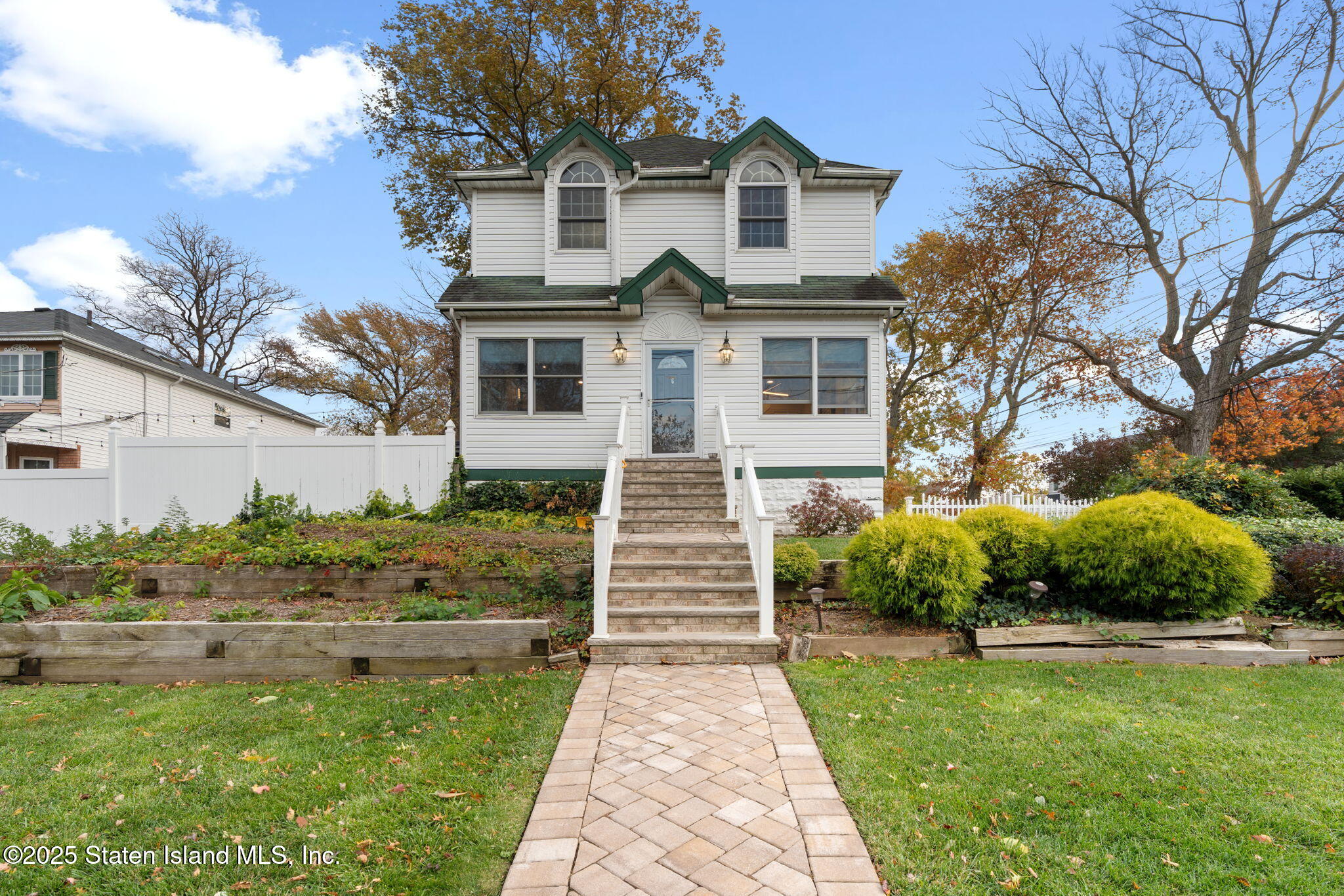 6 Mosely Avenue Staten Island, NY 10312 - Photo 2 of 55 a front view of a house with a yard