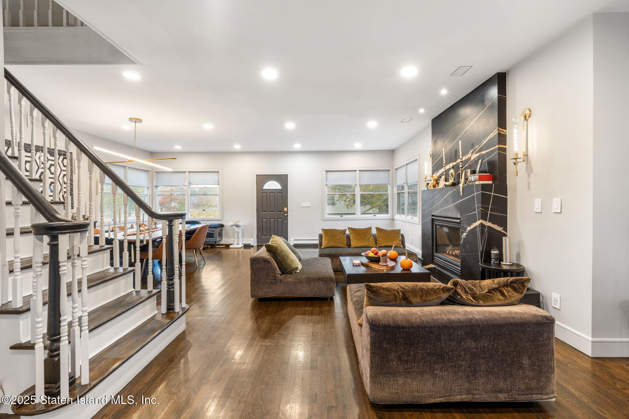 6 Mosely Avenue Staten Island, NY 10312 - Photo 21 of 55 a living room with furniture and a floor to ceiling window