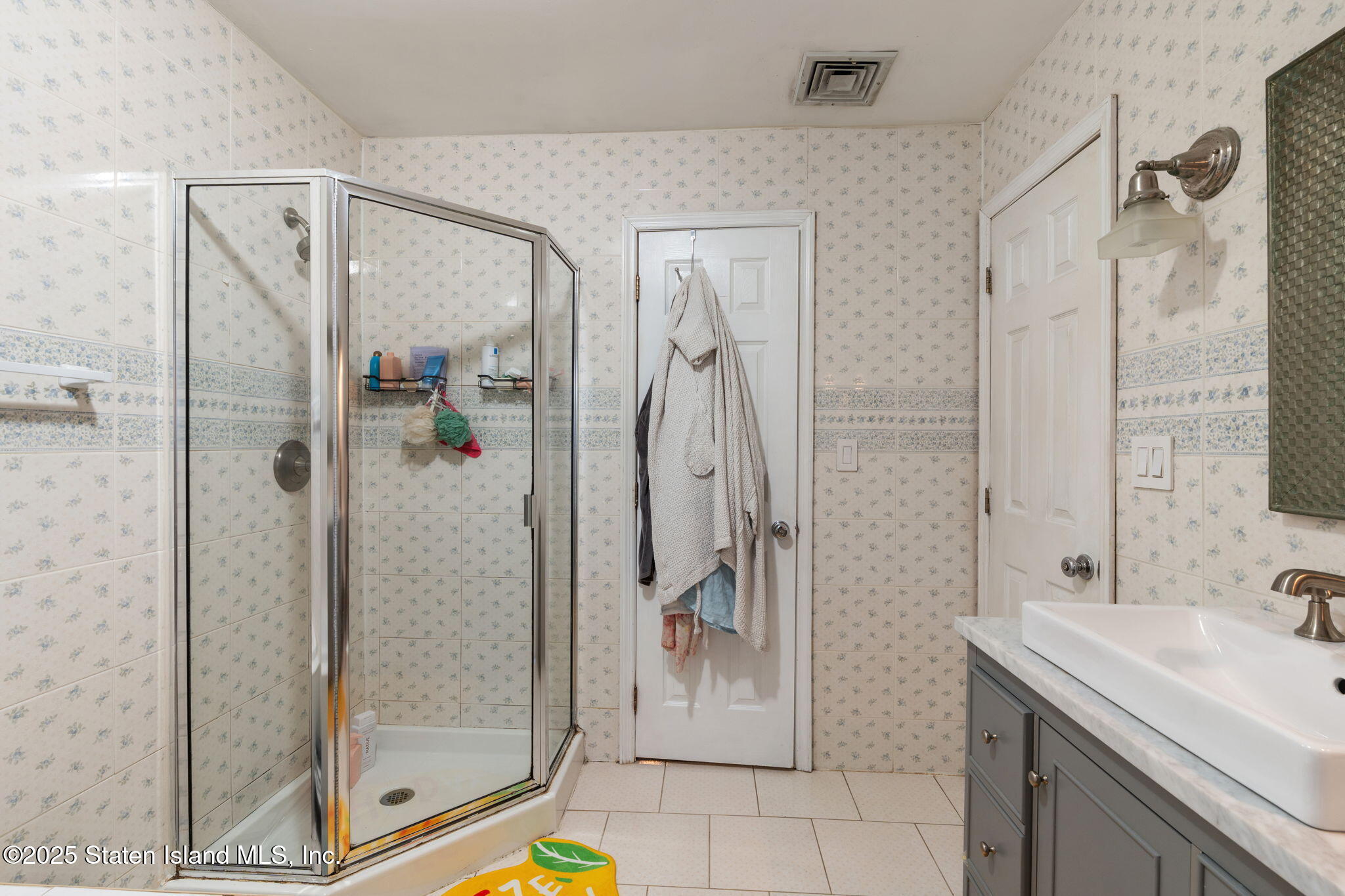 6 Mosely Avenue Staten Island, NY 10312 - Photo 22 of 55 a bathroom with a shower and a sink