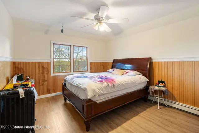 a view of a livingroom with furniture and an empty room