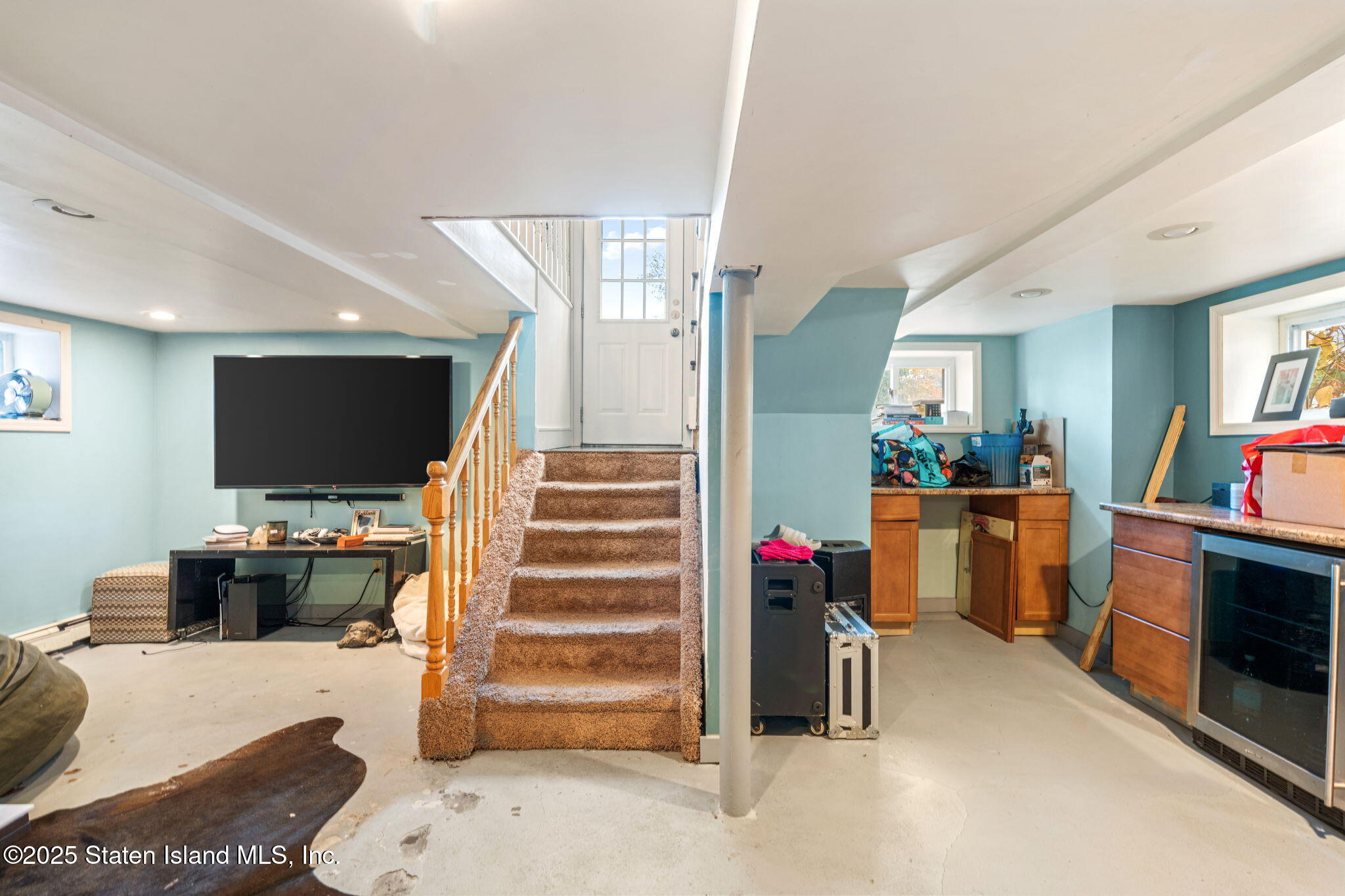 6 Mosely Avenue Staten Island, NY 10312 - Photo 39 of 55 a view of a livingroom with furniture and an empty room