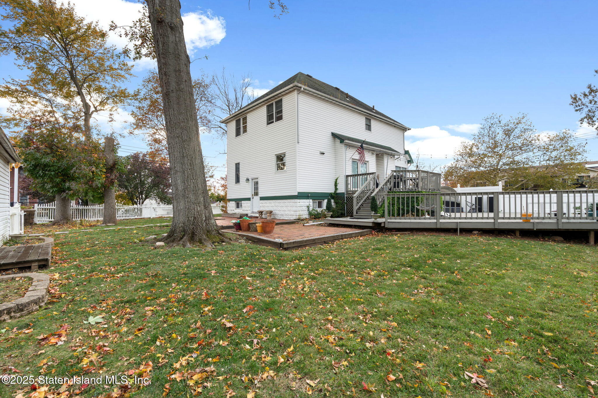 6 Mosely Avenue Staten Island, NY 10312 - Photo 53 of 55 a view of a house with backyard and sitting area