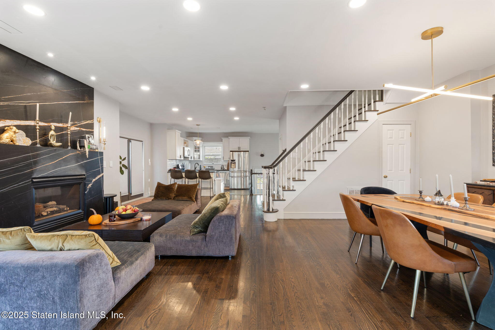 6 Mosely Avenue Staten Island, NY 10312 - Photo 7 of 55 a living room with furniture and a wooden floor